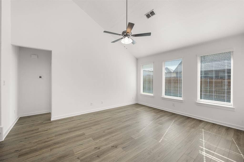 8909 Haste Lane, Aubrey, TX 76227 18_6937 Freight Train- Living Room-1