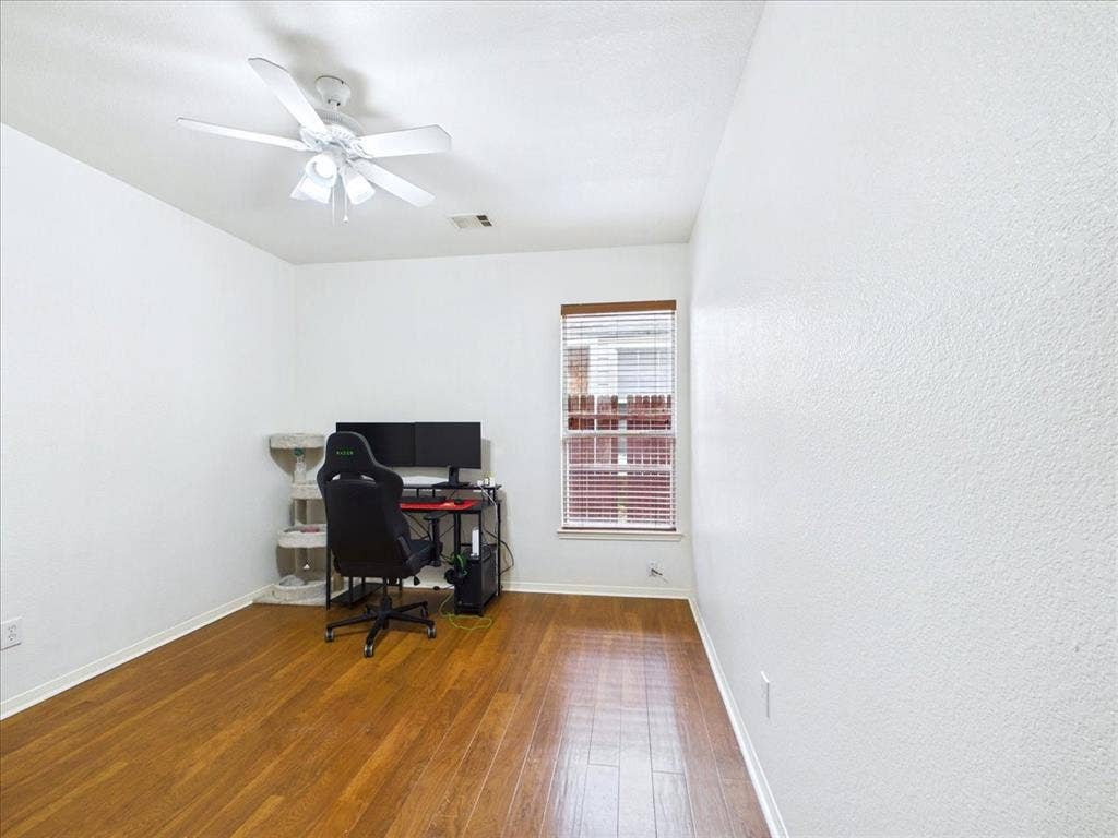 Wood-finish flooring with crisp white walls