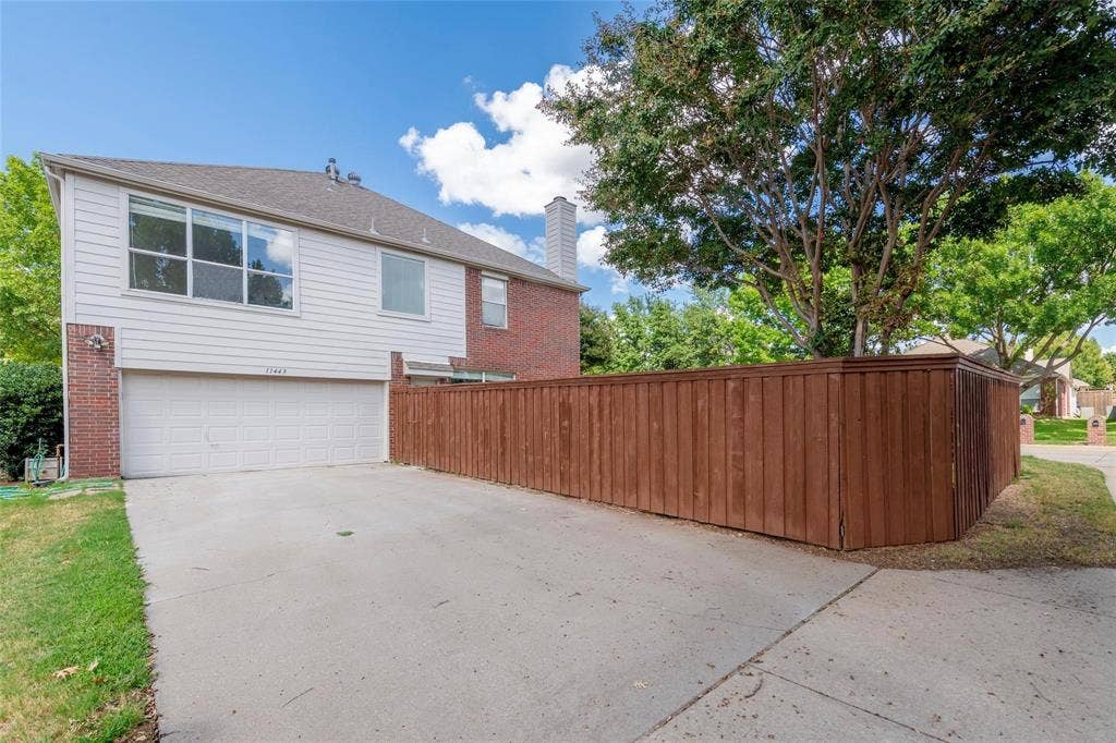 11443 Waterford Lane, Frisco, TX 75035 Two-story exterior with brick and siding facade