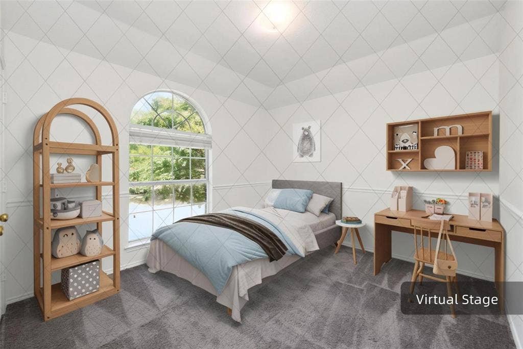 11443 Waterford Lane, Frisco, TX 75035 Arched window with exterior views, patterned wall treatment, wall-mounted shelving, built-in desk, and gray carpeting