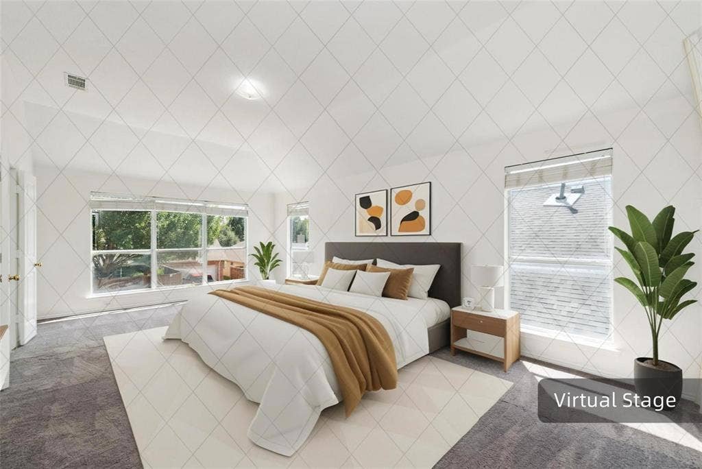 11443 Waterford Lane, Frisco, TX 75035 Vaulted ceiling with an integrated light fixture, multiple windows with blinds, gray carpet flooring, and white walls