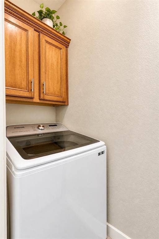 6854 Cortona Lane, Frisco, TX 75034 Built-in wood cabinetry with decorative molding and brushed nickel hardware