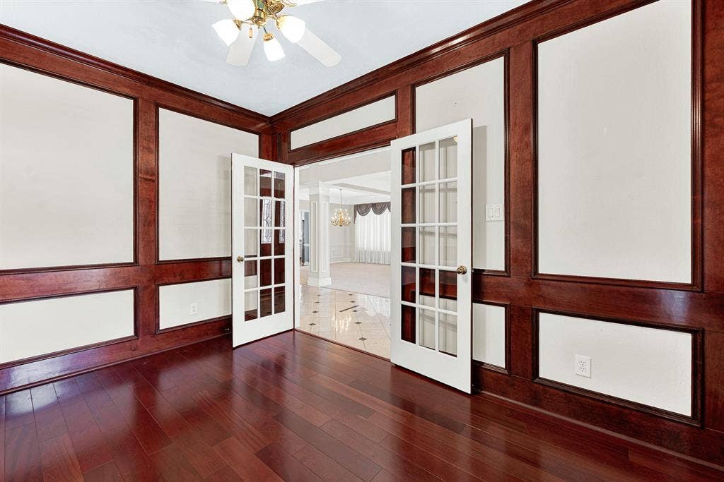 4020 MAYFLOWER Lane, Plano, TX 75024 Multi-pane French doors open wide to connect this workspace with the luminous hallway. Close the glass panels for a quiet afternoon retreat when you need deep focus.