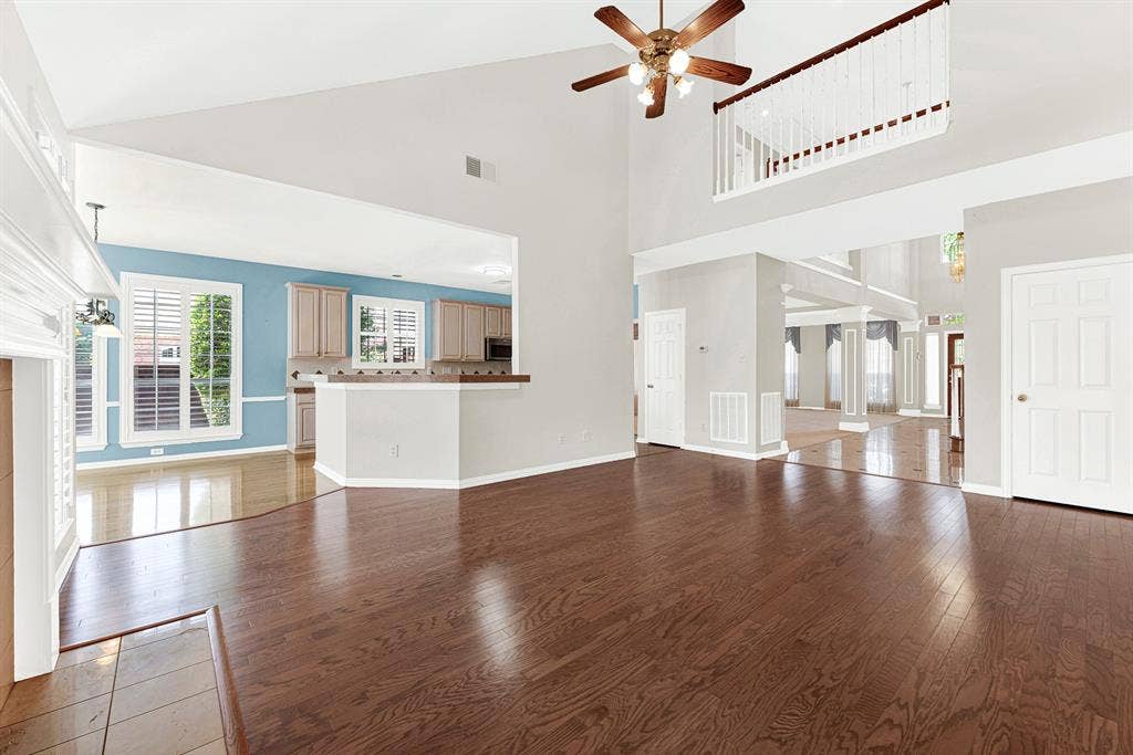 4020 MAYFLOWER Lane, Plano, TX 75024 An overhead indoor balcony overlooks the main floor, creating an airy connection between the levels while wide sightlines lead directly into the kitchen. It’s easy to envision chatting with family while prepping dinner as kids play nearby