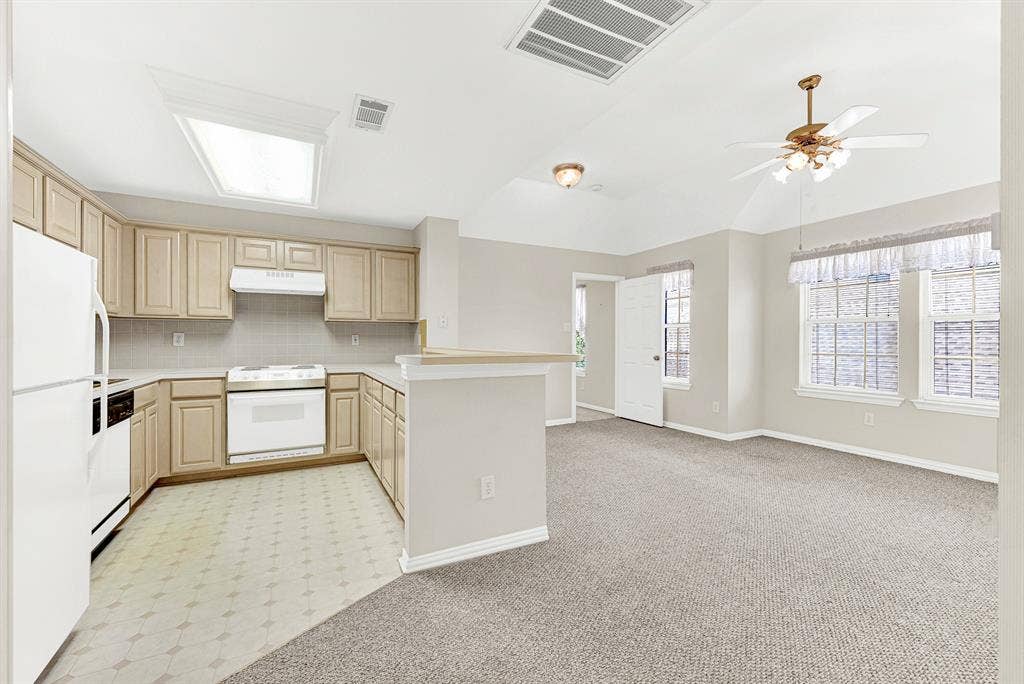 4020 MAYFLOWER Lane, Plano, TX 75024 A raised breakfast counter overlooks the bright sitting room with multi-window views. Host a casual morning visit over coffee without ever leaving the complete in-law suite of the game room.