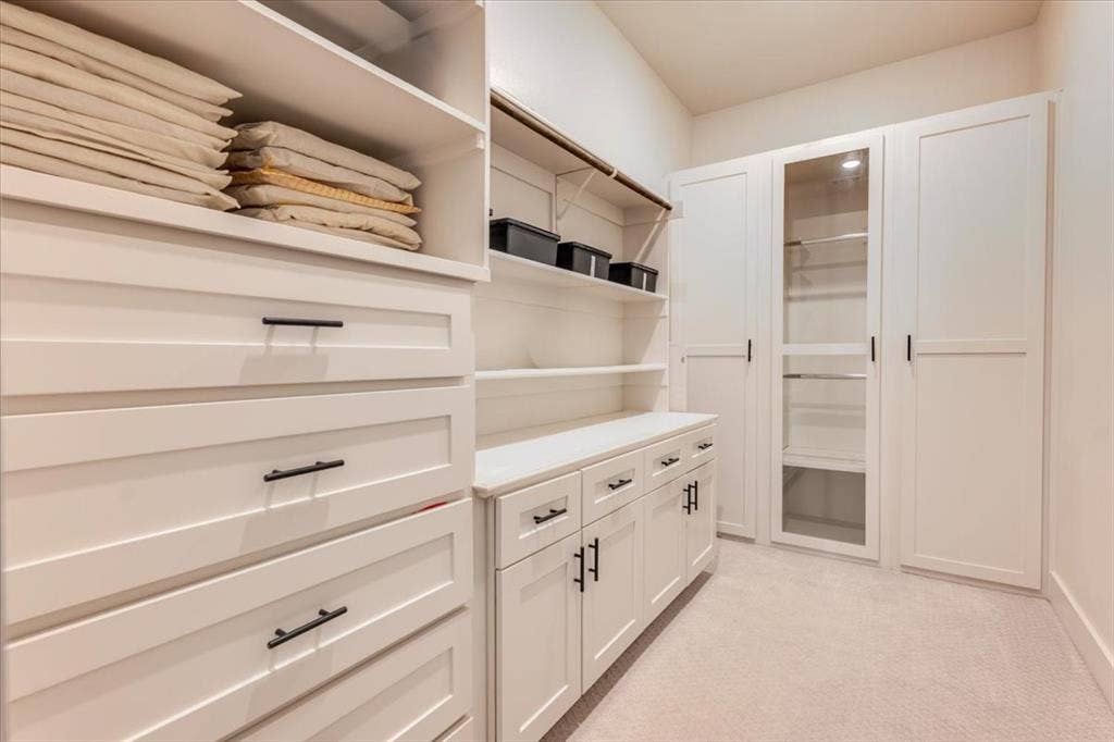 4102 Parkview Boulevard, Celina, TX 75009 Custom built-in storage with drawers, open shelving, and full-height cabinetry