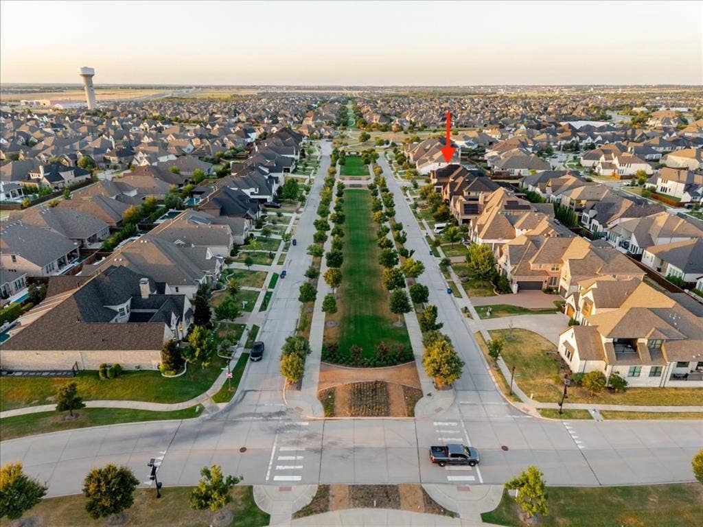 4102 Parkview Boulevard, Celina, TX 75009 Expansive residential community with established homes, tree-lined streets, and a prominent green median