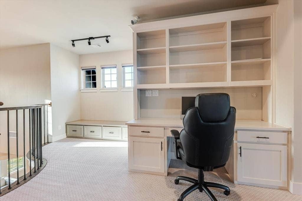 4102 Parkview Boulevard, Celina, TX 75009 Built-in desk with upper shelving, integrated cabinetry, and track lighting