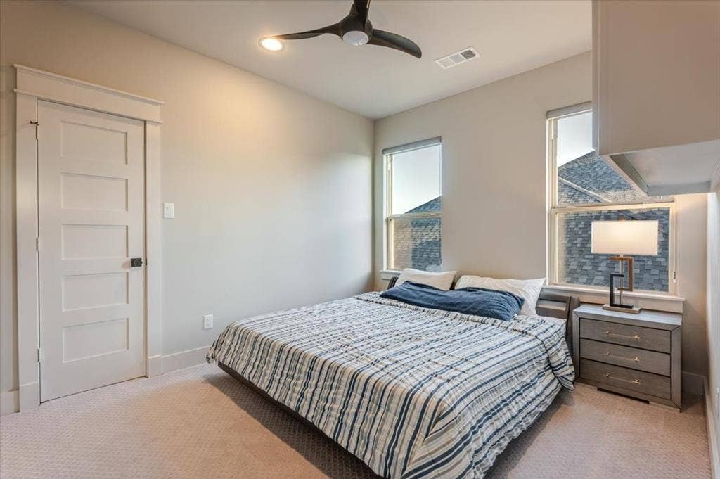 4102 Parkview Boulevard, Celina, TX 75009 Recessed lighting, ceiling fan, two windows, paneled door, and carpeted flooring