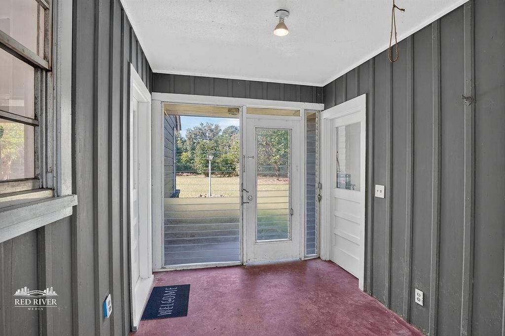 3749 Bobbitt Drive, Shreveport, LA 71107 Breezeway between the garage and the home provides a lovely space to be outside but inside