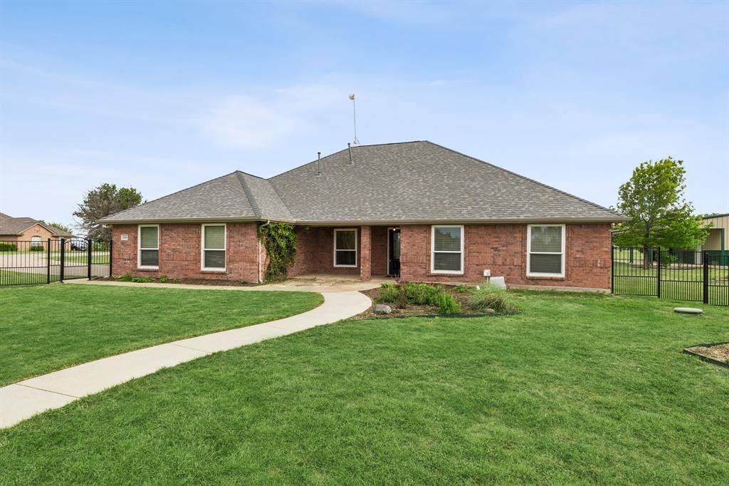 Beautiful Outdoor Setting With Green Space, Gardens, And Sunset Views