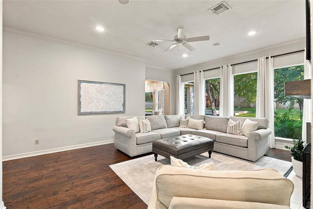 11408 Somerville Drive, Temple, TX 76502 Recessed lighting, crown molding, wood-finish flooring, ceiling fan, and multiple large windows