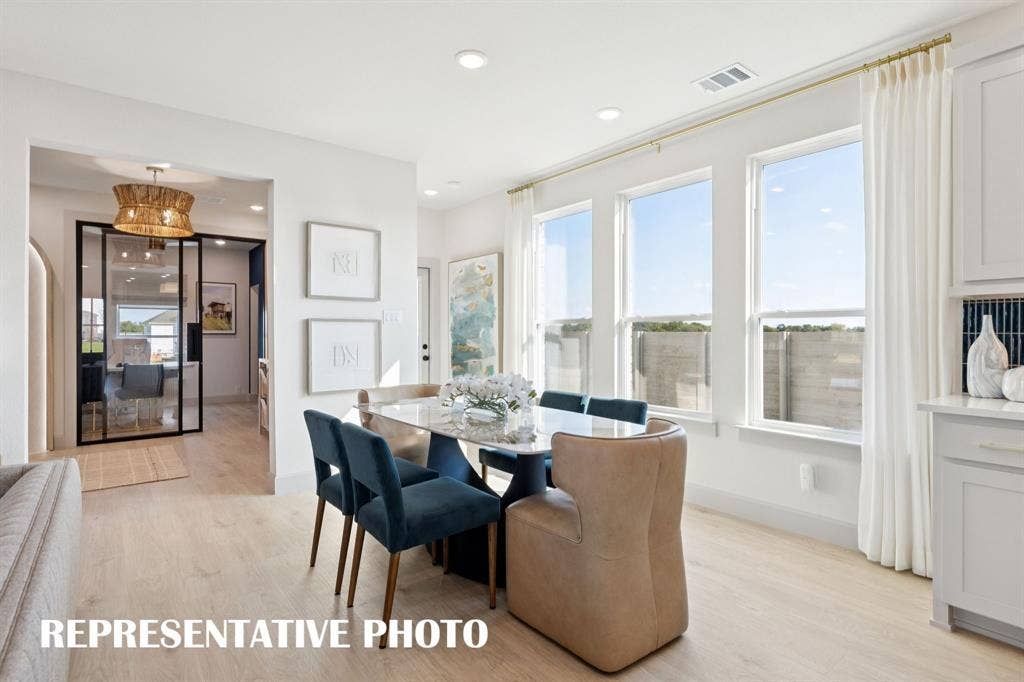 3733 Homer Court, McKinney, TX 75071 Whether it's lively dinner parties or cozy family meals, this dining room fits all occasions! REPRESENTATIVE PHOTO