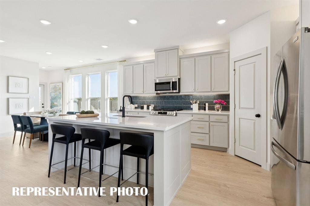 3733 Homer Court, McKinney, TX 75071 You'll find kitchens with gorgeous color palettes, striking trim and modern stainless steel in our wonderful Bella II plan. REPRESENTATIVE PHOTO