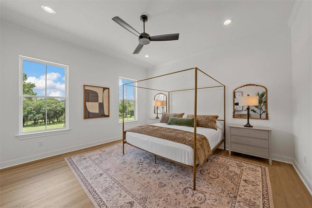 20 N Ritchie Road, Woodway, TX 76712 Spacious room featuring wood-finish flooring, recessed lighting, and a contemporary ceiling fan