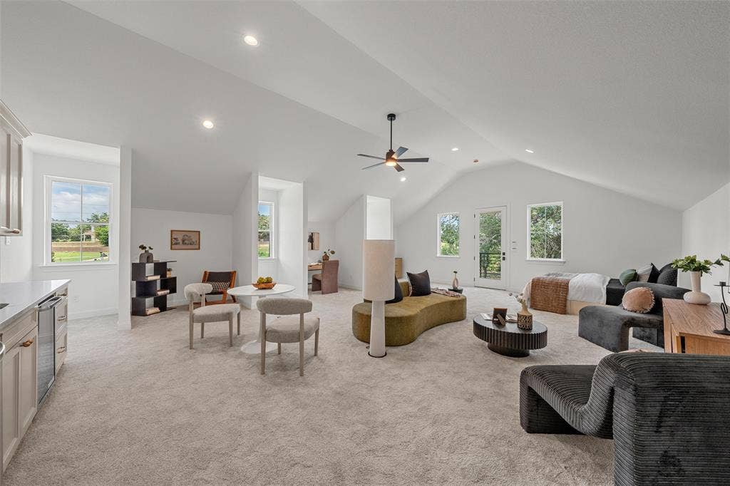 20 N Ritchie Road, Woodway, TX 76712 Spacious room with vaulted ceilings, recessed lighting, and light-toned carpeting