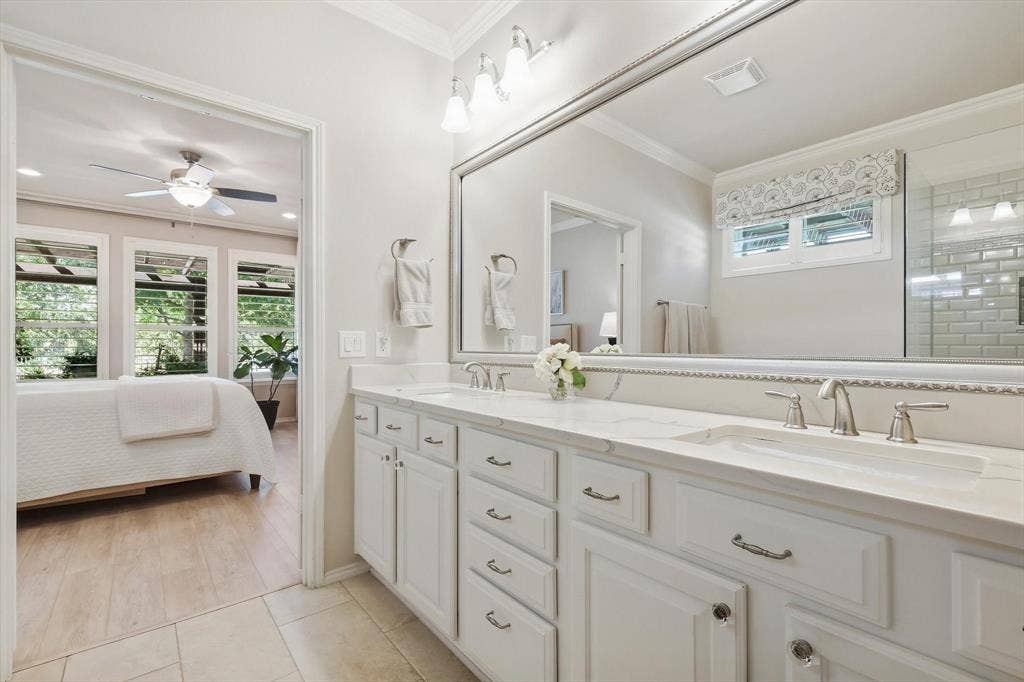 1641 Overwood Drive, Frisco, TX 75036 Ensuite Primary Bathroom with a Double vanity, integrated countertop, undermount sinks, and brushed nickel faucets