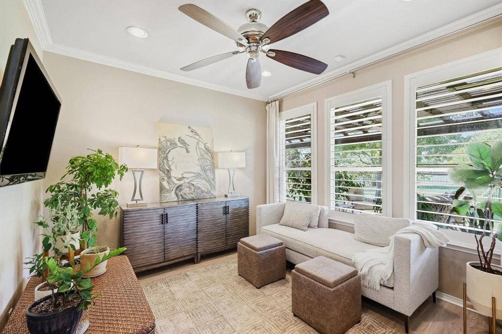 1641 Overwood Drive, Frisco, TX 75036 Study or secondary Living Area with Recessed lighting, crown molding, ceiling fan, natural wood-finish flooring, and white plantation shutters with great views of the beatiful landcaped backyard