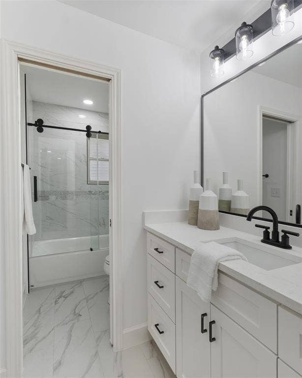 1612 Northcrest Drive, Plano, TX 75075 White shaker vanity with a quartz countertop, undermount sink, and matte black faucet