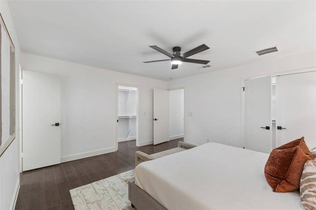 1612 Northcrest Drive, Plano, TX 75075 Wood-finish flooring, white walls, and a contemporary ceiling fan with integrated lighting