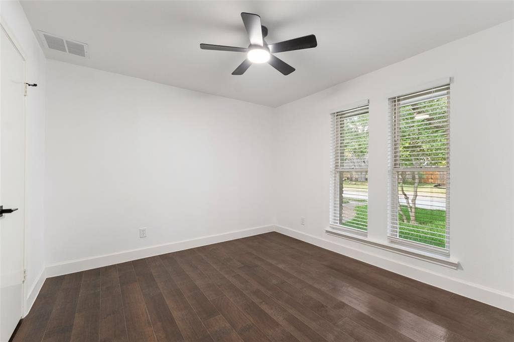 1612 Northcrest Drive, Plano, TX 75075 Wood-finish flooring, dual windows with blinds, and a ceiling fan with integrated lighting