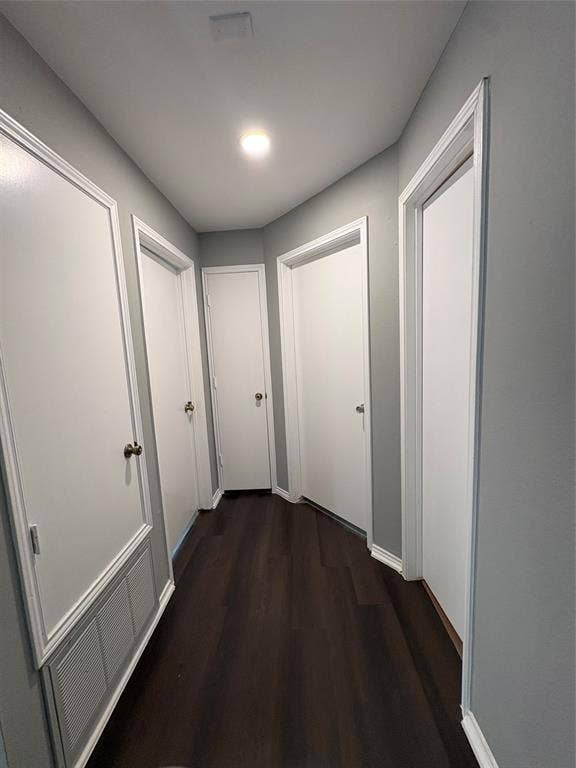 1120 Old Barn Lane, Mesquite, TX 75149 Wood-finish flooring with crisp white trim, recessed lighting, and bright white doors