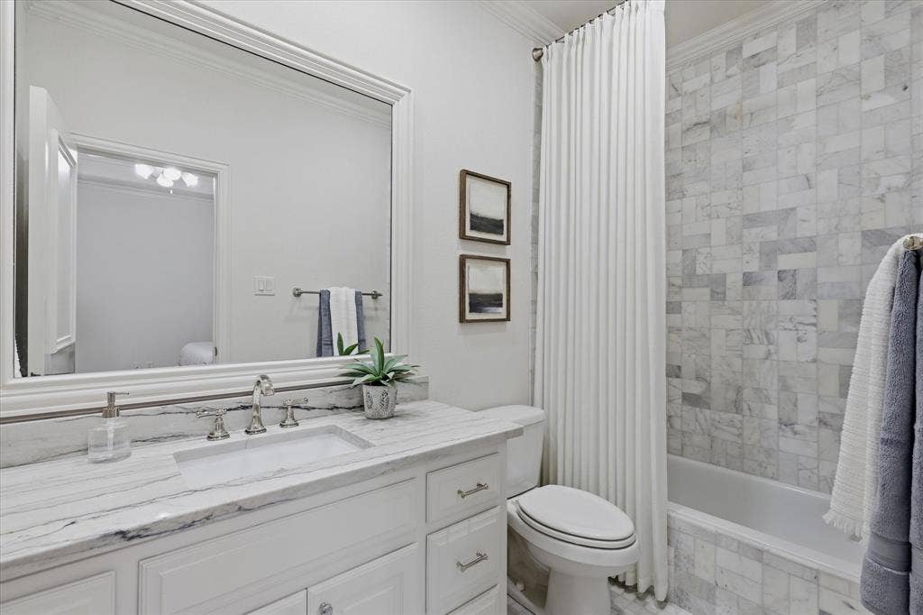 A beautifully updated ensuite bath completes this private upstairs bedroom suite.
