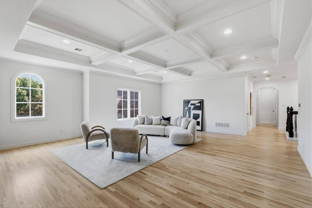 The generous upstairs living area provides flexible space for games, conversation and relaxation.