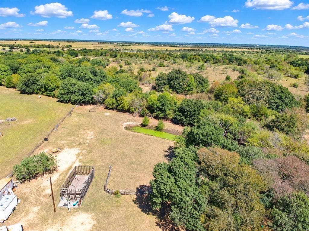 7245 County Road 4095, Kaufman, TX 75142 Expansive property featuring a mix of open land and mature tree coverage