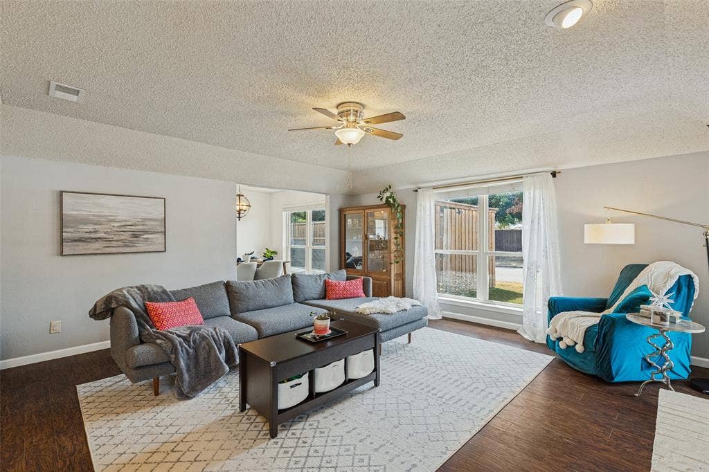 822 Century Park Drive, Garland, TX 75040 Vaulted living room with gas fireplace
