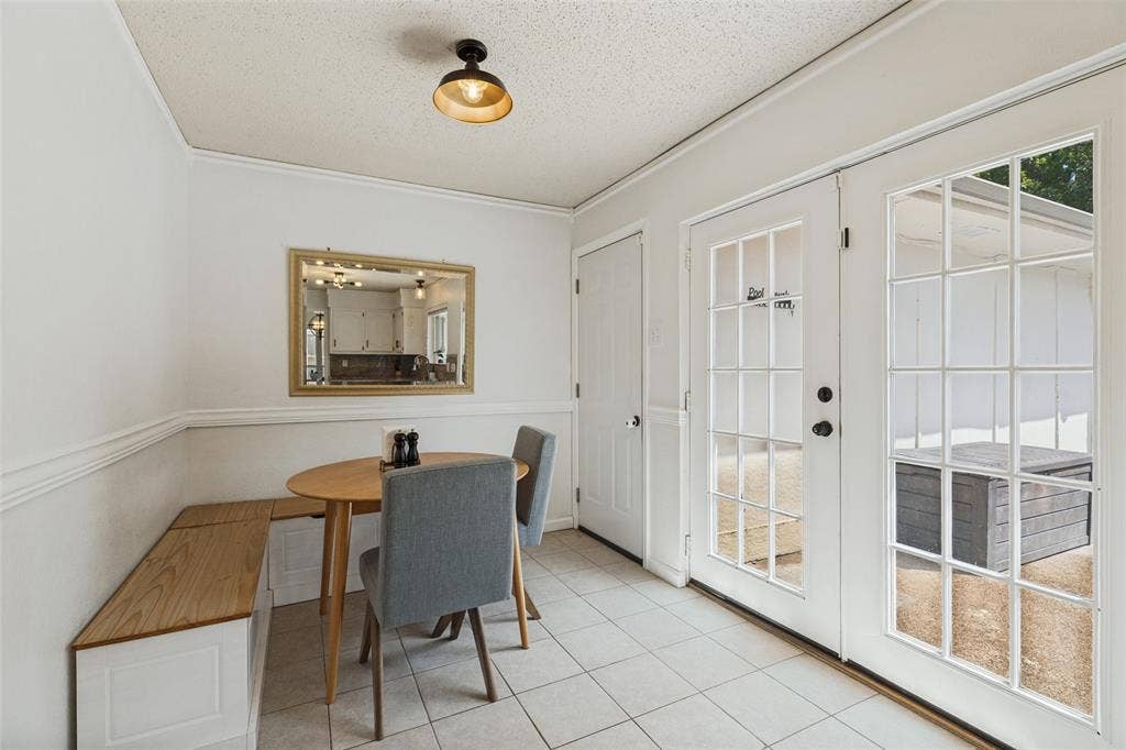 822 Century Park Drive, Garland, TX 75040 Dinette area of the kitchen with double doors to the backyard