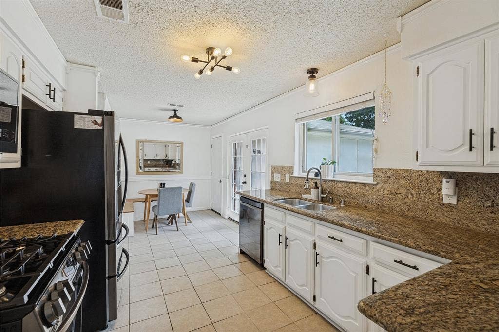 822 Century Park Drive, Garland, TX 75040 Recently updated appliances and light fixtures