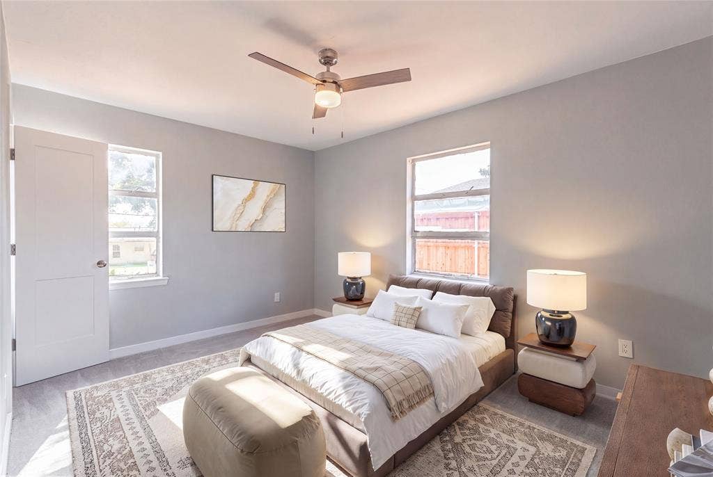 12326 Dandridge Drive, Dallas, TX 75243 Ceiling fan with integrated lighting, two panel doors, and two windows