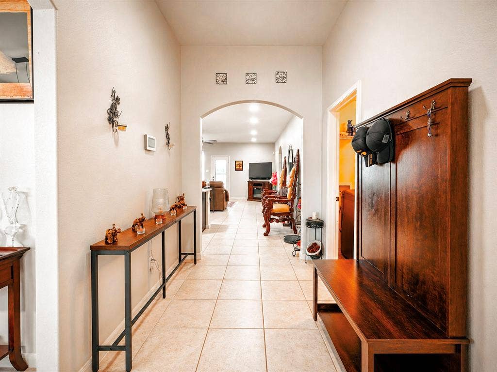 Arched doorway entry to main living areas