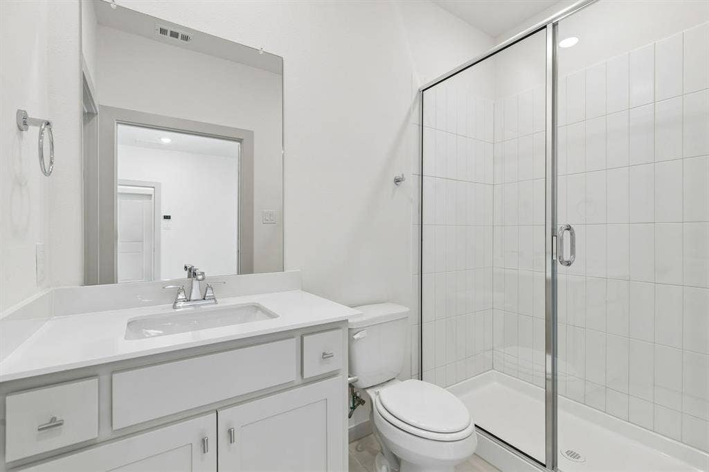 6901 Chief Spotted Tail Drive, McKinney, TX 75070 Friends and family will feel right at home in any of the beautifully finished guest baths our Juliet plan offers.