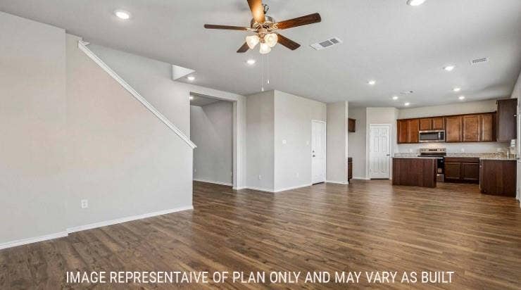 Wood-finish flooring throughout, recessed lighting, and a ceiling fan