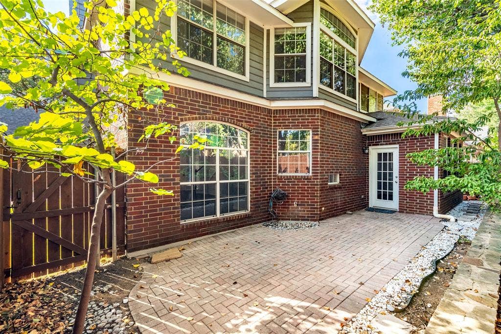 14592 Aspen Court, Addison, TX 75001 Brick exterior with second-story siding