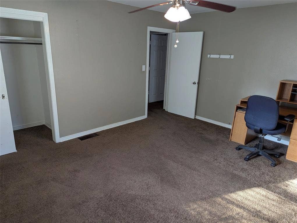 111 Murchison Street, Farmersville, TX 75442 Another view of Bedroom #2, highlighting neutral wall colors, generous floor space, and a convenient closet. Great potential for a bedroom, guest room, or home office!