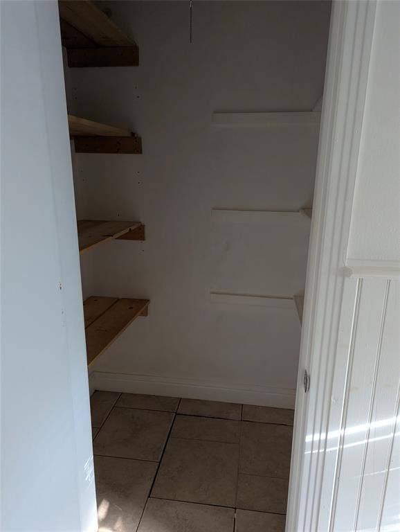 111 Murchison Street, Farmersville, TX 75442 Convenient linen closet with built-in shelving and access to the crawl space serving this section of the home.