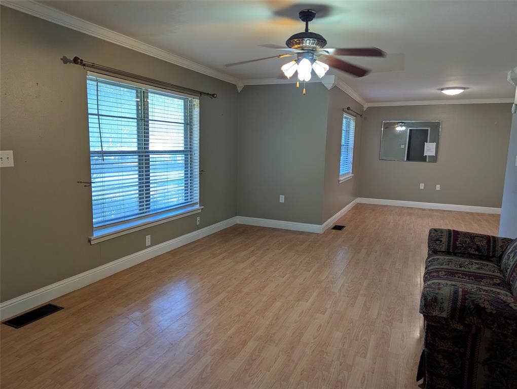 111 Murchison Street, Farmersville, TX 75442 Opposite angle view of the living & dining rooms showing the space has the open view for family connections.
