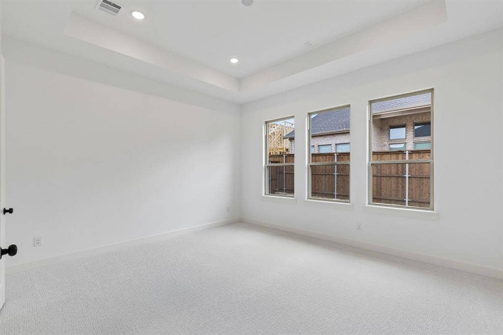 15756 Split Bark Lane, Frisco, TX 75033 The light filled owner's suite is located at the back of the home for additional privacy.