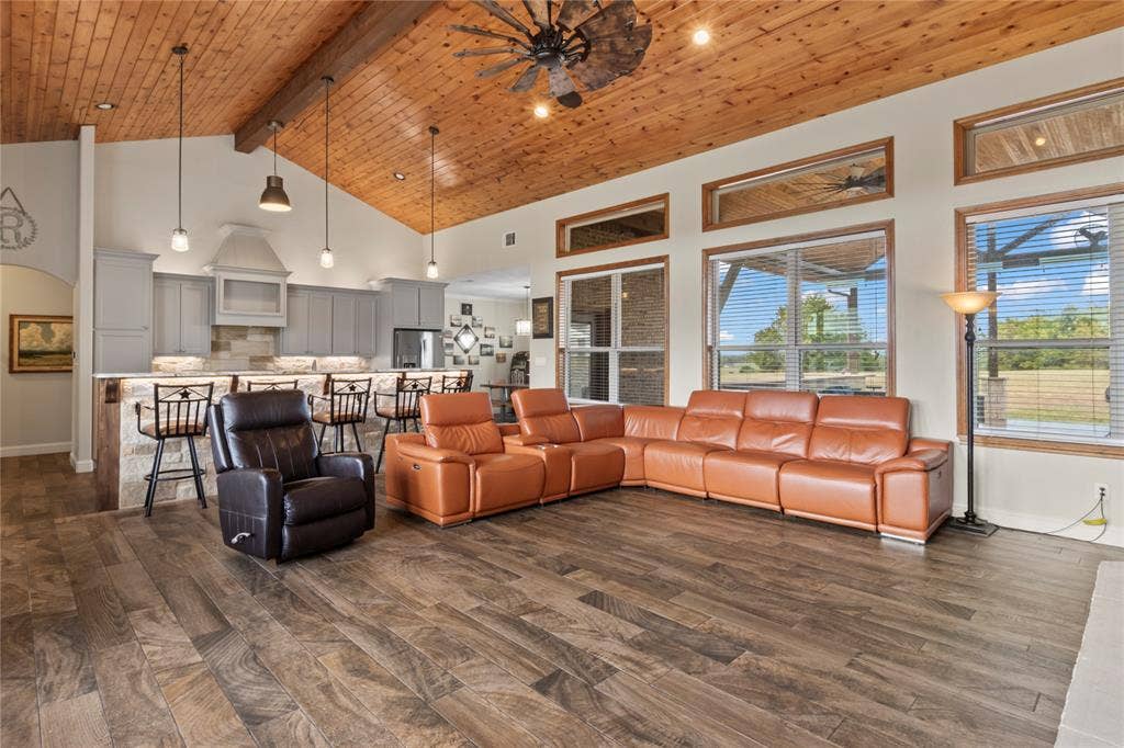 4830 Bridle View Court, Athens, TX 75752 Living room with wall of windows overlooking 2 acres on a hill