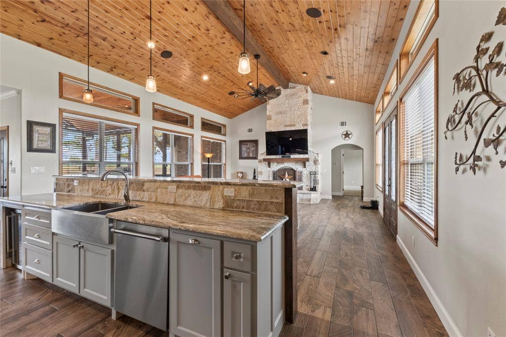 4830 Bridle View Court, Athens, TX 75752 Kitchen with bar seating open to living room