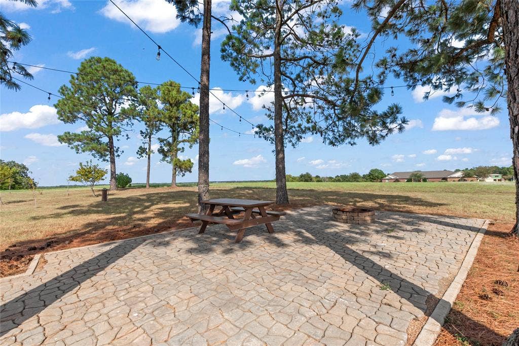4830 Bridle View Court, Athens, TX 75752 Patio with fire pit with a great breeze and view