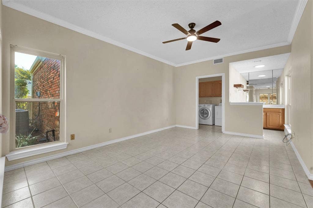 1920 Keystone Drive, Plano, TX 75075 Tile flooring, ceiling fan with integrated lighting, window, built-in cabinetry, mirrored wall