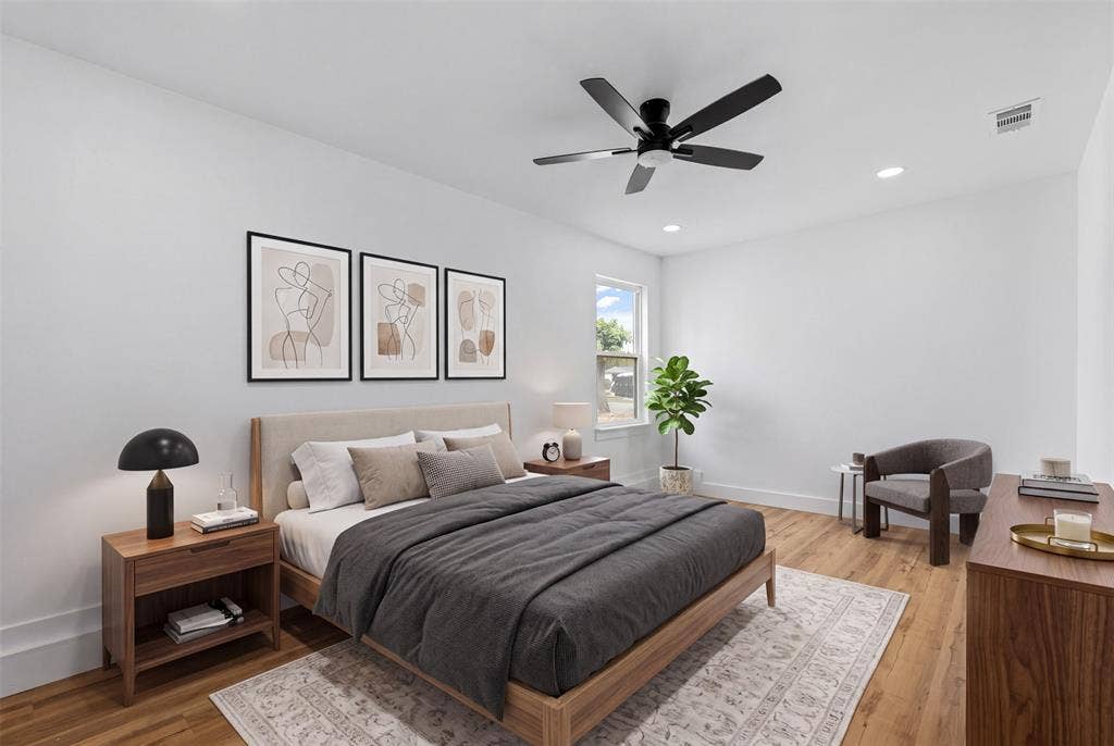 565 alcorn Avenue, Dallas, TX 75217 Wood-finish flooring throughout, white walls, and a recessed lighting package