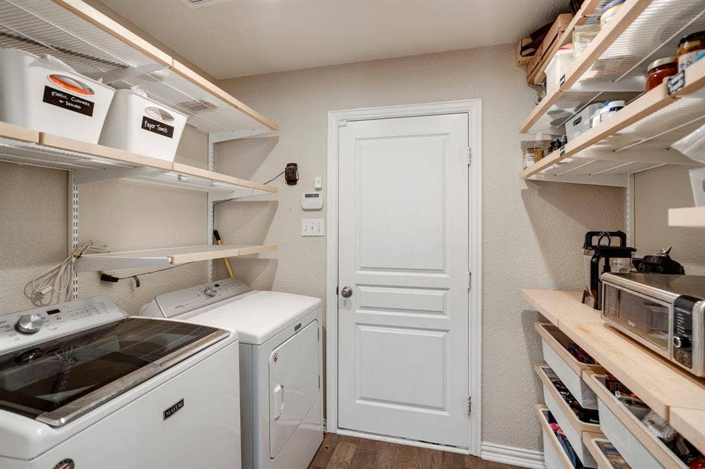 11701 Cambria Court, Fort Worth, TX 76008 Laundry area featuring a top-load washing machine and front-load dryer
