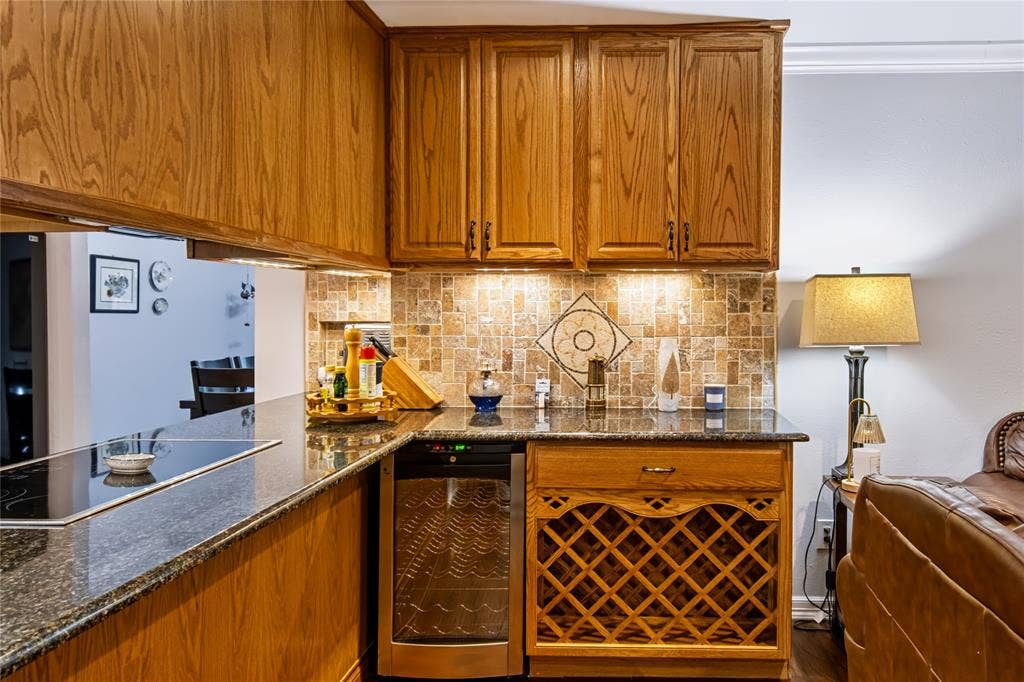 104 Trailwood Court, Burleson, TX 76028 Wine bar with built-in rack and cold storage