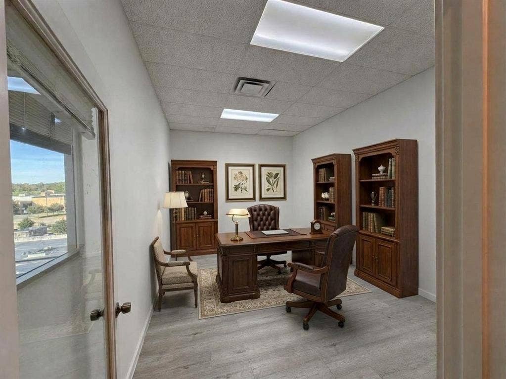 607 Cedar Street, Cedar Hill, TX 75104 Recessed fluorescent lighting, wood-finish flooring, full-height windows, and glass entry door