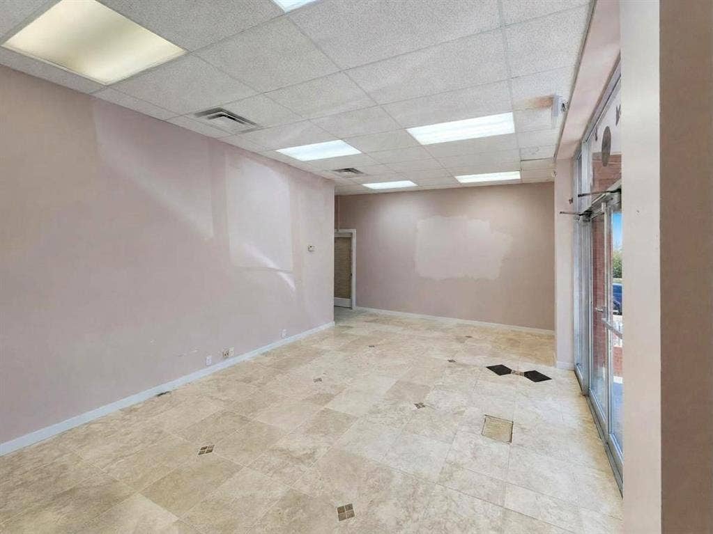 607 Cedar Street, Cedar Hill, TX 75104 Recessed fluorescent lighting, drop ceiling, tile flooring with decorative accents, and full-light glass entry doors